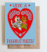 We're a Purrfect Match Card.

Card is A6 4.5" x 6.25" and comes with an envelope and sleeved for protection.

Cards are folded and blank inside.

Envelope is Kraft Brown.

Professionally printed on heavy matte natural card stock.

Printed in USA.