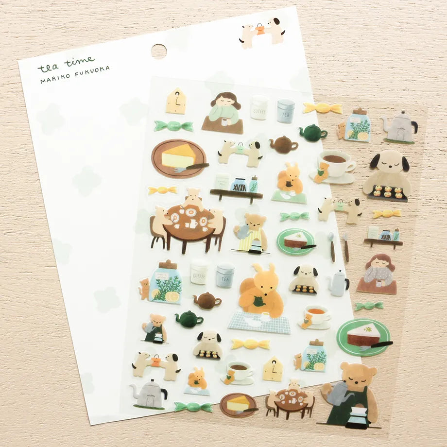 This cute sticker designed by illustrator Mariko Fukuoka looks like a delicious aroma might waft through the air at any moment. Freshly baked cookies served with coffee brewed by a bear barista.


Printed on PET material, the stickers have a smooth, durable finish that’s easy to peel and place - great for both everyday use and special projects.

✨ Product Details

Smooth, durable PET sticker material
Perfect for planners, journals, scrapbooking, and cardmaking
Backing Sheet Size: 141 × 188 mm
Sticker sheet 