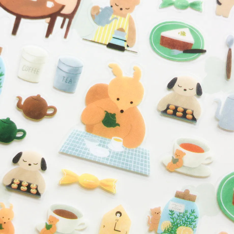 This cute sticker designed by illustrator Mariko Fukuoka looks like a delicious aroma might waft through the air at any moment. Freshly baked cookies served with coffee brewed by a bear barista.


Printed on PET material, the stickers have a smooth, durable finish that’s easy to peel and place - great for both everyday use and special projects.

✨ Product Details

Smooth, durable PET sticker material
Perfect for planners, journals, scrapbooking, and cardmaking
Backing Sheet Size: 141 × 188 mm
Sticker sheet 