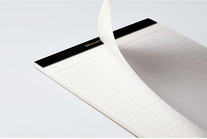 Maruman Mnemosyne A5 Soft Cover Notepad Holder contains a high quality 50 sheet notepad. Made of high quality PVC material, this beautiful black notepad cover is lightweight and slim and fits perfectly in briefcases or backpacks. This is the perfect notepad to write down ideas and plans wherever you are. Durable but soft and flexible protective cover protects the notepad inside.

The notepad is securely placed on the right side of the cover to take notes. The left side pocket is perfect for storing cards or