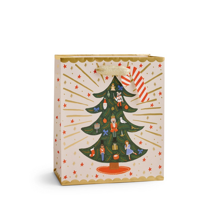 Medium Nutcracker Sweets Tree Gift Bag

Giving gets even more special with our gift bags, which feature charming extras like gold foil accents, cotton ribbon handles, and a coordinating “To” and “From” tag.

DETAILS

Medium: 9.5" L × 8" W
Uncoated paper with cotton ribbon&nbsp;
Printed in full color and foil stamped
Metallic gold foil
Metallic cotton ribbon handles
Cardboard floor insert