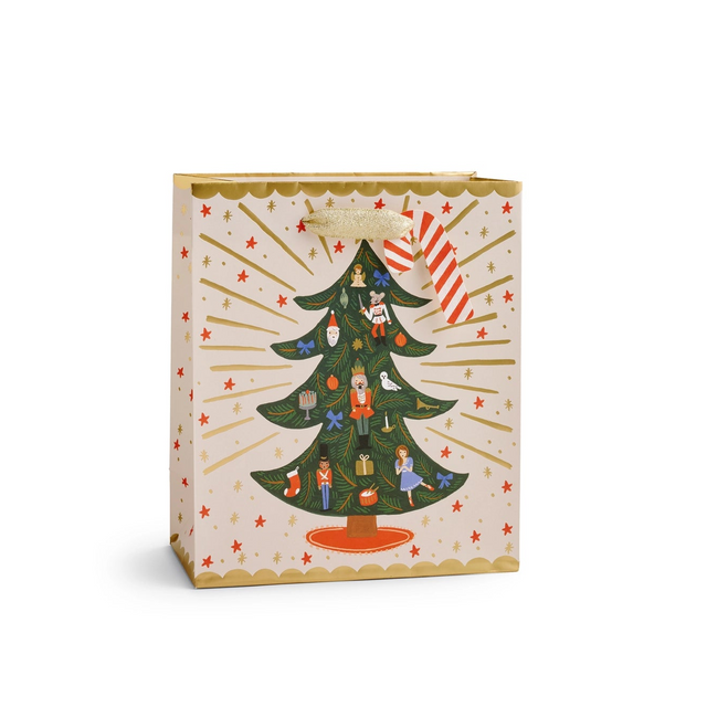 Medium Nutcracker Sweets Tree Gift Bag

Giving gets even more special with our gift bags, which feature charming extras like gold foil accents, cotton ribbon handles, and a coordinating “To” and “From” tag.

DETAILS

Medium: 9.5" L × 8" W
Uncoated paper with cotton ribbon&nbsp;
Printed in full color and foil stamped
Metallic gold foil
Metallic cotton ribbon handles
Cardboard floor insert