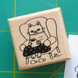 Megan Wang - Cozy Cat Stamp

Decorate your planner or journal with this adorable stamp! Perched on his favorite chair with a cozy blanket and warm mug, this cozy cat is perfect to represent your coziest days.&nbsp;

1 x 1 inch wooden rubber stamp