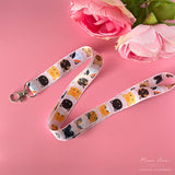 The cute cat pattern showcases a variety of adorable felines and will surely make you stand out. Keep your belongings close and add a touch of cuteness to your daily routine.

2cm X 95cm
double-sided printing
Swiveling Lobster Clasp&nbsp;