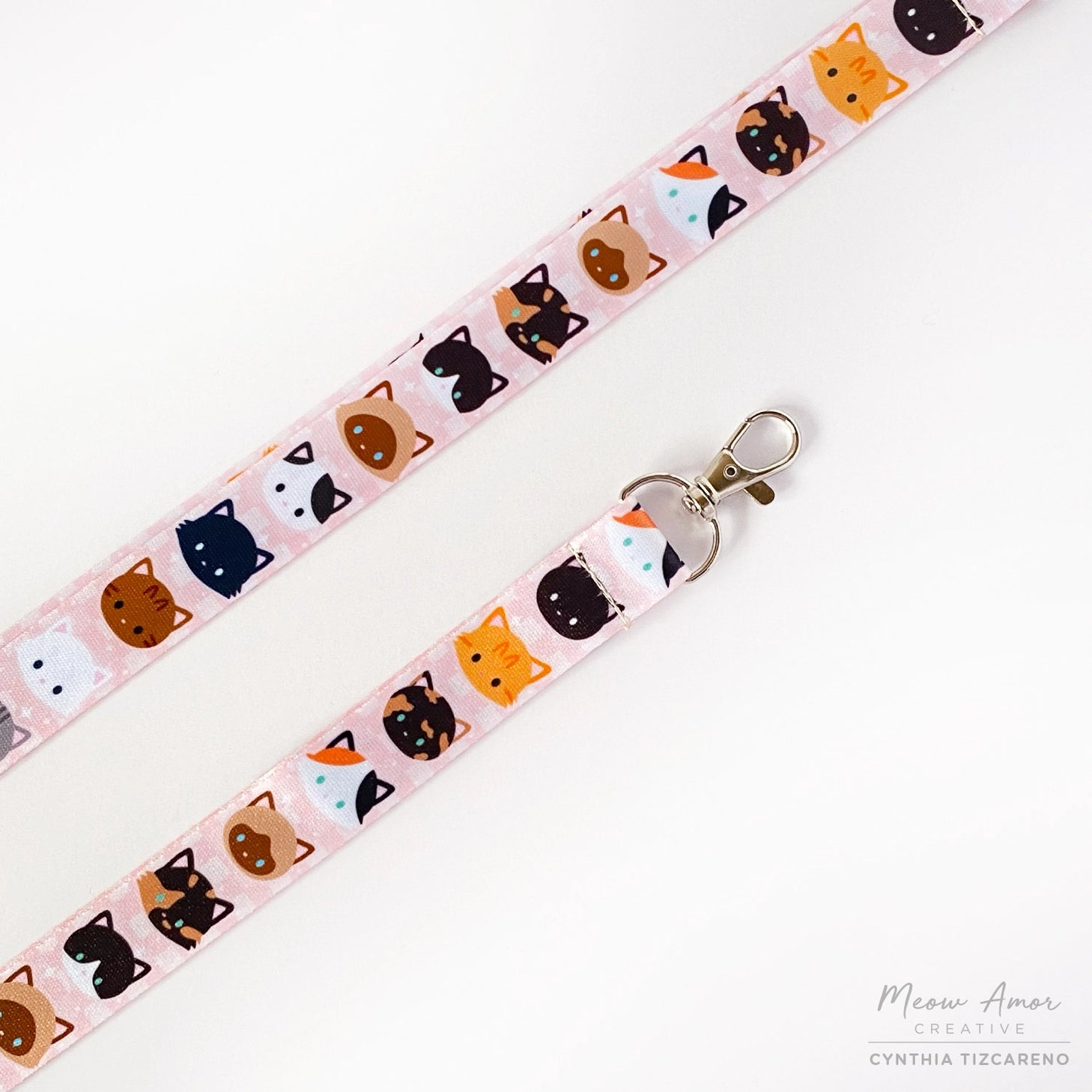 The cute cat pattern showcases a variety of adorable felines and will surely make you stand out. Keep your belongings close and add a touch of cuteness to your daily routine.

2cm X 95cm
double-sided printing
Swiveling Lobster Clasp&nbsp;