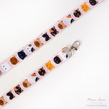 The cute cat pattern showcases a variety of adorable felines and will surely make you stand out. Keep your belongings close and add a touch of cuteness to your daily routine.

2cm X 95cm
double-sided printing
Swiveling Lobster Clasp&nbsp;