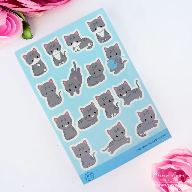 This vinyl sticker sheet features a variety of gray tabby cats. Brighten up your belongings with these sweet, durable stickers that stick to laptops, water bottles, journals, and more.

4x6 Sheet
Vinyl Sticker
Colors might vary just a bit from your screen.