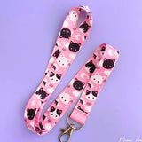 Make sure you never lose your keys again with this Meow Meow Pink Lanyard! Adorably designed with cute black and white cats, this lanyard is sure to bring a smile to your face each time you use it. Its strong and durable construction will keep your keys safe and secure.

2cm X 95cm
double-sided printing
Swiveling Lobster Clasp&nbsp;