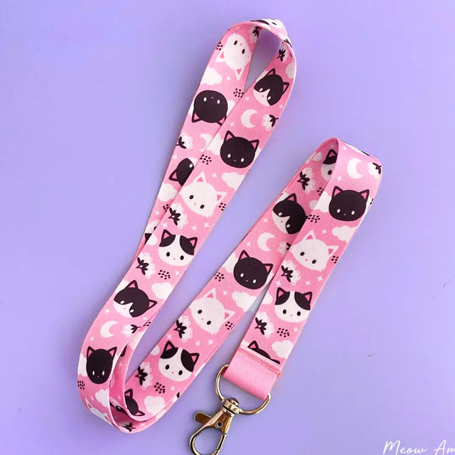 Make sure you never lose your keys again with this Meow Meow Pink Lanyard! Adorably designed with cute black and white cats, this lanyard is sure to bring a smile to your face each time you use it. Its strong and durable construction will keep your keys safe and secure.

2cm X 95cm
double-sided printing
Swiveling Lobster Clasp&nbsp;