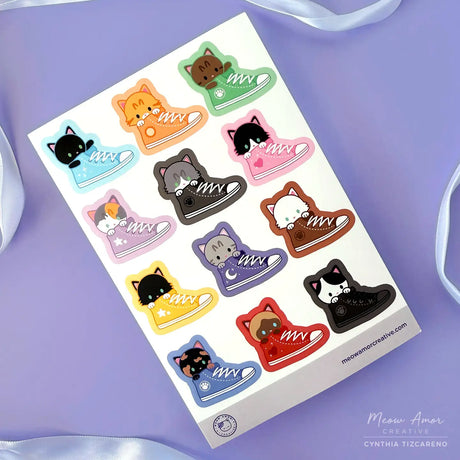 Featuring adorable cats in sneakers, these stickers are perfect for decorating laptops, water bottles, notebooks, and more. Made from durable vinyl, they resist water and fading, keeping your favorite feline friends looking cute wherever you stick them.

4x6 Sheet
Vinyl Sticker
Colors might vary just a bit from your screen.