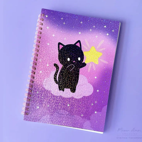 Organize your sticker collection with charm and ease using the Bat Cat : Reusable Sticker Book : Reusable Sticker Book! Includes 50 sheets of easy-release sticker paper and a spiral-bound design, this playful book keeps your stickers neatly in place and ready for fun. Reusable pages allow for easy repositioning, so you can enjoy decorating without the commitment.

One A5 spiral bound sticker book | 5.83" x 8.27"
Sparkle Cover&nbsp;
Pink Spiral&nbsp;
Double sided&nbsp;
50 sheets (100 pages per book) of doubl