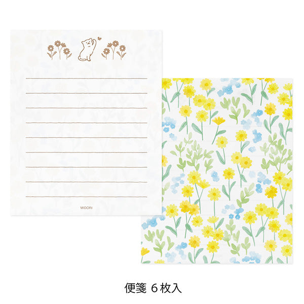 A refreshing stationery design featuring yellow and light blue flowers. On the writing side of the stationery, you can see a cat playing with butterflies in a flower garden.
Stickers adorned with cat gestures like holding flowers in its mouth or giving an upward glance are soothing