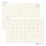 The Midori Diary Hibino 2027 is a fantastic tool for keeping track of your daily activities. This A6-sized notebook features a 2-page layout, making it easy to adapt to your unique needs. Starting in January 2027, each spread has identical left and right pages with a 2.5 mm grid, perfect for sketches and diagrams. The left page includes a 24-hour time axis, weather icons, and moon phases. It also comes with an annual calendar for an overview of the year, a 12-month future log to plan your goals month by mon