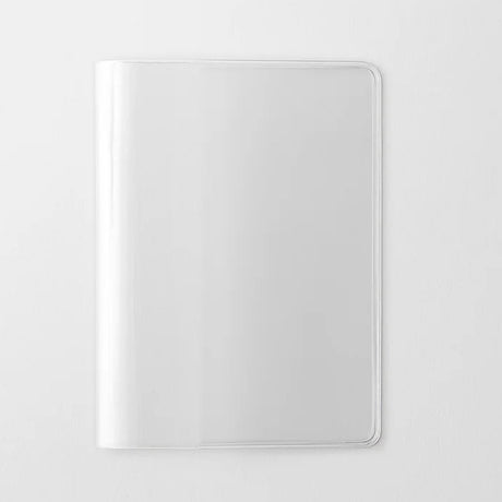 A transparent cover that fits snugly around your MD Notebook

This is a special cover that gently wraps your MD Notebook. The transparent cover protects the notebook from dirt without ruining its appearance.
It subtly protects your notebook from water and dirt without interfering with its characteristics. If you put the cover on with the glassine paper still wrapped around it, the inorganic feel of the vinyl will be softened.
Because it is transparent, you can enjoy the cover design, illustrations, and writ
