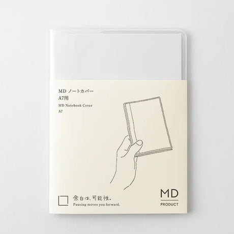 A transparent cover that fits snugly around your MD Notebook

This is a special cover that gently wraps your MD Notebook. The transparent cover protects the notebook from dirt without ruining its appearance.
It subtly protects your notebook from water and dirt without interfering with its characteristics. If you put the cover on with the glassine paper still wrapped around it, the inorganic feel of the vinyl will be softened.
Because it is transparent, you can enjoy the cover design, illustrations, and writ