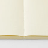 Crafted in Japan, this minimalist notebook is designed to enhance your writing experience. Inside, you'll find the high-quality Midori Diary (MD) paper, first developed in 1960 and refined ever since. Midori has rigorously tested this paper with various writing instruments to ensure quality, checking for ink feathering or bleeding, drying time, the smoothness of pen tips on the surface, and the tactile feel. The result is a paper that resists bleeding and feathering and is fountain-pen friendly, ensuring a 