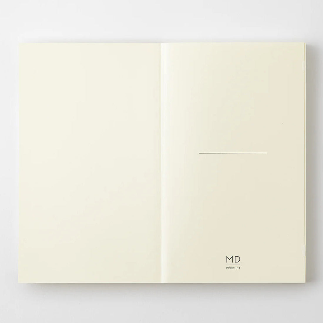 Crafted in Japan, this minimalist notebook is designed to enhance your writing experience. Inside, you'll find the high-quality Midori Diary (MD) paper, first developed in 1960 and refined ever since. Midori has rigorously tested this paper with various writing instruments to ensure quality, checking for ink feathering or bleeding, drying time, the smoothness of pen tips on the surface, and the tactile feel. The result is a paper that resists bleeding and feathering and is fountain-pen friendly, ensuring a 