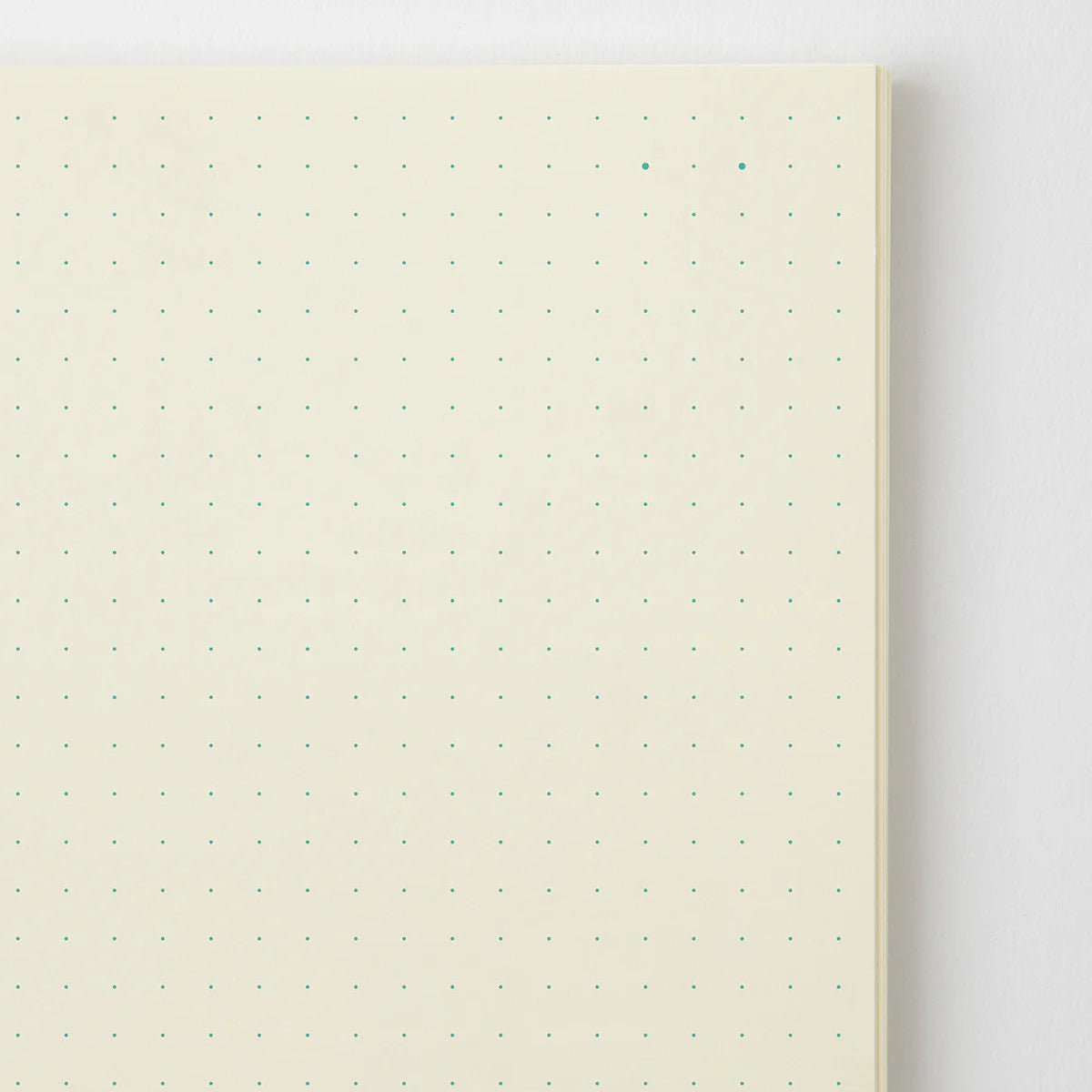 Crafted in Japan, this minimalist notebook is designed to enhance your writing experience. Inside, you'll find the high-quality Midori Diary (MD) paper, first developed in 1960 and refined ever since. Midori has rigorously tested this paper with various writing instruments to ensure quality, checking for ink feathering or bleeding, drying time, the smoothness of pen tips on the surface, and the tactile feel. The result is a paper that resists bleeding and feathering and is fountain-pen friendly, ensuring a 