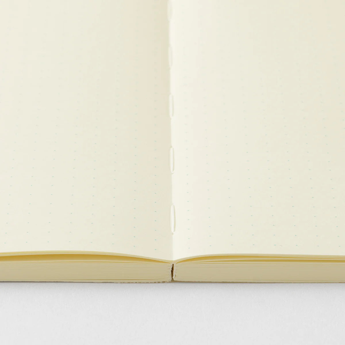 Crafted in Japan, this minimalist notebook is designed to enhance your writing experience. Inside, you'll find the high-quality Midori Diary (MD) paper, first developed in 1960 and refined ever since. Midori has rigorously tested this paper with various writing instruments to ensure quality, checking for ink feathering or bleeding, drying time, the smoothness of pen tips on the surface, and the tactile feel. The result is a paper that resists bleeding and feathering and is fountain-pen friendly, ensuring a 