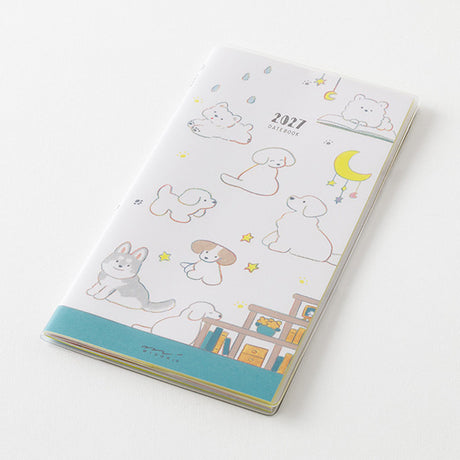 With the theme of "A Year Living with Dogs," the 2027 edition features a design that lets you fully enjoy the world of each page along with the seasonal colors, from everyday scenes to those slightly removed from the everyday world. We focused on a layout where the illustration of the dog, drawn in vivid colors and rainbow-colored main lines, spreads across the entire page.



A Colorful&nbsp;Diary of Dogs: We have invited the popular illustrator 'Kanatsumi Terao' to vividly depict adorable dogs of all bree