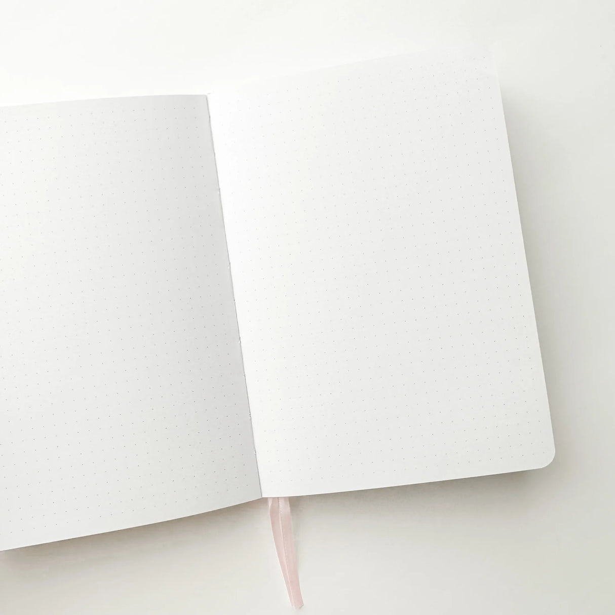 Soft pastel vegan leather bullet journal with delicate gold foil details, made to make your everyday planning feel a little more special ✨

Product Details:

Size: A5 (5.70 x 8.26 inches)
160 Dotted Grid Pages (5 x 5 mm)
2 Bookmarks
Elastic Band and Pen Holder
Expandable storage compartment