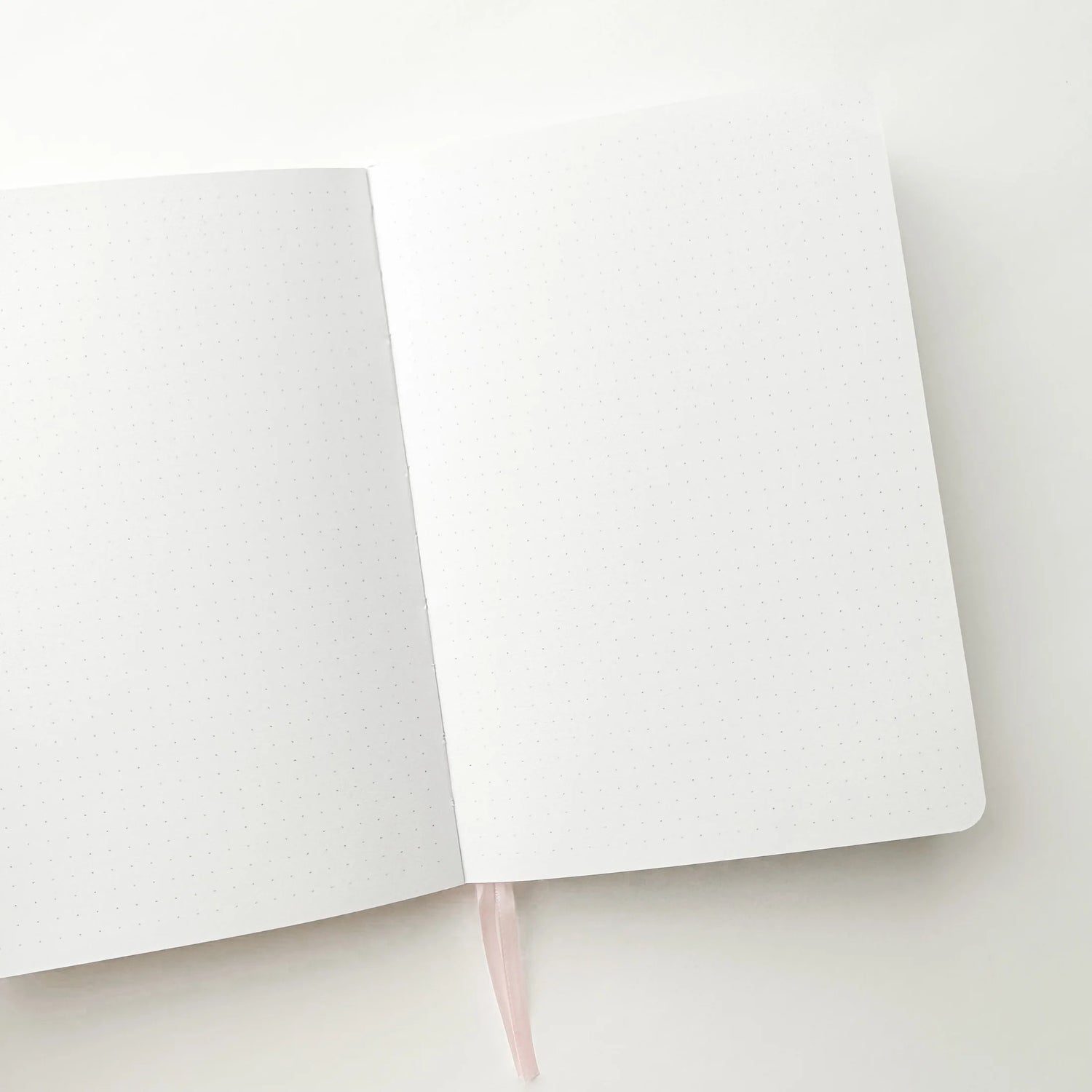 Soft pastel vegan leather bullet journal with delicate gold foil details, made to make your everyday planning feel a little more special ✨

Product Details:

Size: A5 (5.70 x 8.26 inches)
160 Dotted Grid Pages (5 x 5 mm)
2 Bookmarks
Elastic Band and Pen Holder
Expandable storage compartment