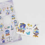 This is an illustration sticker that traps a fantasy world view and motif in a glass container like a snow globe or terrarium. It is a sparkling hologram specification.

• This package includes 1&nbsp;sheet of sticker
• Material: Transparent PET Hologram Lamination
• Package measures approx. H202 x W93 x D1mm
• Made in Japan
