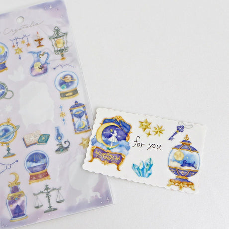 This is an illustration sticker that traps a fantasy world view and motif in a glass container like a snow globe or terrarium. It is a sparkling hologram specification.

• This package includes 1&nbsp;sheet of sticker
• Material: Transparent PET Hologram Lamination
• Package measures approx. H202 x W93 x D1mm
• Made in Japan