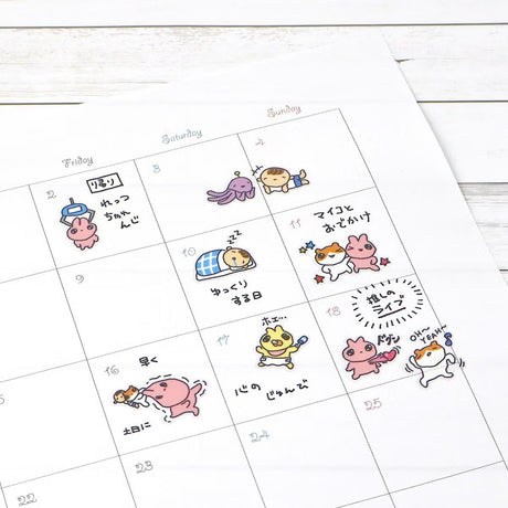 This adorable sticker sheet was illustrated by Maho Minami. It depicts mini sized characters going through life.&nbsp;

7in x 3.5in
Includes 1 sticker sheet