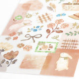Sheet of decorative stickers with floral, bunny, and bow designs on a white background.