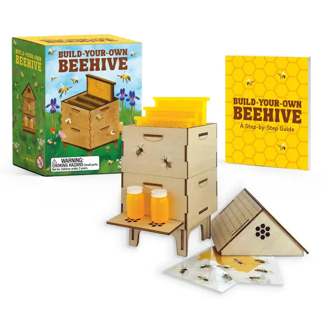 Embrace the spirit of beekeeping and build your very own miniature beehive right at your desk.

Specifications: Includes 15 pieces of pre-cut wood to assemble into a 4-inch-tall beehive with a hinged lid, complete with removeable acrylic stickers of simulated honey and bees. Also includes 2 faux jars of honey 

Illustrated Mini Book: Includes a 48-page mini book with essential information about how to raise your own honeybees and other beehive basics 

A Unique Gift: The perfect gift item for beekeepers, be