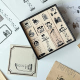 Meet the cat who makes Mondays magical. Our Mischievous Cat Stamp Set illustrates her morning routine—from coffee cup mischief to dramatic stretches and playful distractions. She’s cute, a little chaotic, and endlessly relatable. Use these stamps to decorate your spreads and give your week a lighthearted, whimsical start.

Easy to clean with ordinary alcohol wipe, alcohol gel, or special seal cleaner.

Brand: WT (The Washi Tape Shop)
Box size: 10cm × 10cm × 3.5cm
Stamp size:
22mm x 20mm x 4 pieces
22mm x 24