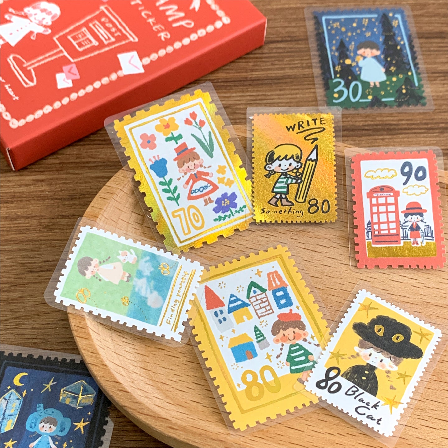 Molinta Postage Stamp Sticker Pack

Add a charming, vintage‑inspired touch to your journaling and crafting with these sticker packs. Designed to look like tiny collectible stamps, each one features delicate illustrations and foil accents that make every piece feel special. Whether you’re decorating planner spreads, pen‑pal letters, scrapbooks, or gift tags, these stickers bring a nostalgic, travel‑themed aesthetic to any project.

Red box - Gold foil
Blue box - Silver foil
Each box includes 30 total sticker