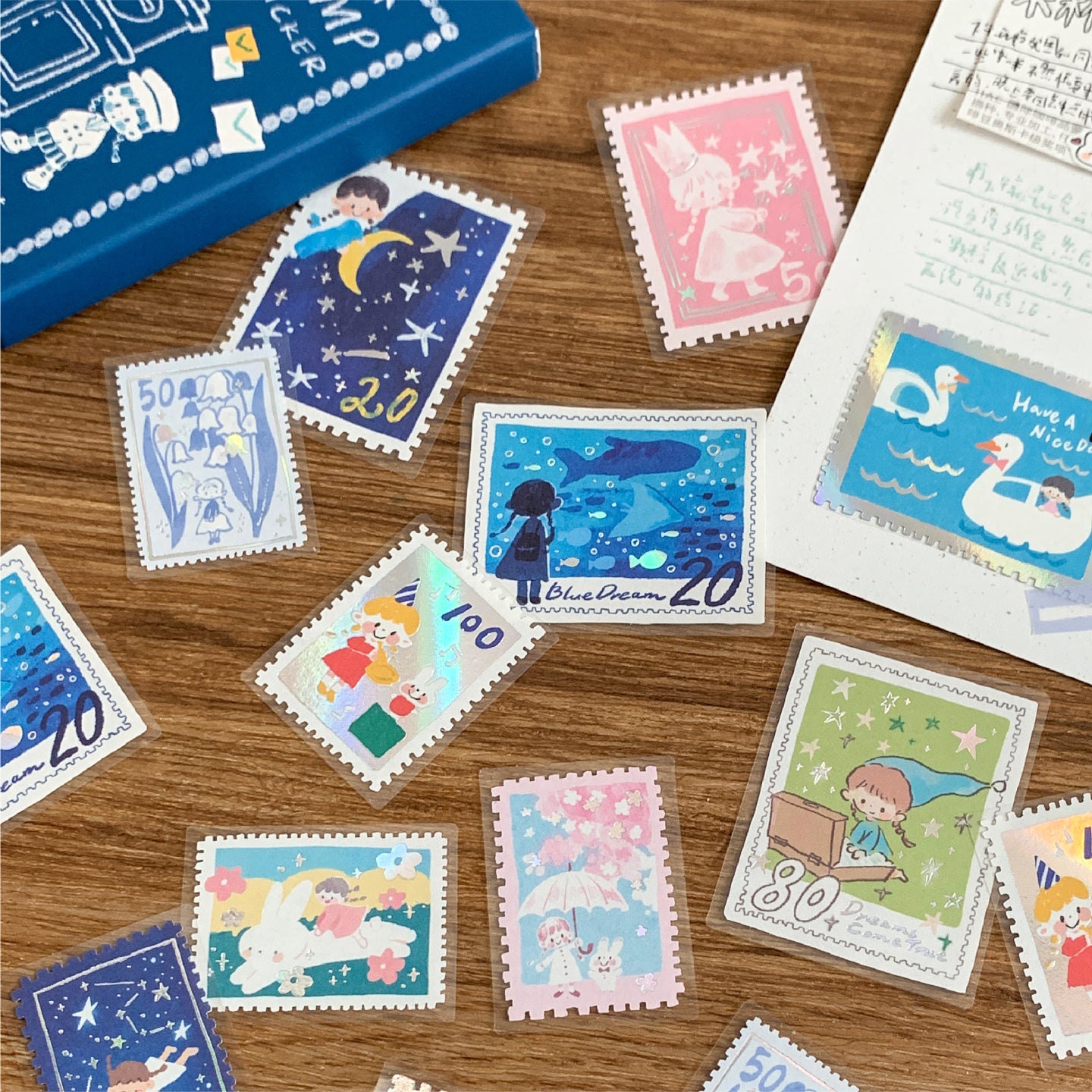 Molinta Postage Stamp Sticker Pack

Add a charming, vintage‑inspired touch to your journaling and crafting with these sticker packs. Designed to look like tiny collectible stamps, each one features delicate illustrations and foil accents that make every piece feel special. Whether you’re decorating planner spreads, pen‑pal letters, scrapbooks, or gift tags, these stickers bring a nostalgic, travel‑themed aesthetic to any project.

Red box - Gold foil
Blue box - Silver foil
Each box includes 30 total sticker