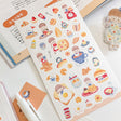 Molinta Sticker Sheet - Morning Baking

Celebrate your love for baking with this charming Molinta sticker sheet. Featuring adorable illustrations in Molinta’s signature whimsical style, these stickers are perfect for decorating planners, journals, scrapbooks, and happy mail.

90x158mm
Material: Cotton Paper
Includes 1 sticker sheet