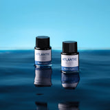 The new Nahvalur Explorer ink collection is comprised of four fountain pen inks—Dark Forest, Atlantic Blue, Orchid Flower, and Mango Sorbet—each inspired by one of the original Nahvalur Explorer Plus fountain pens. The box packaging features a lighthouse illustration in the ink color. The 20-ml round glass bottles have a hexagonal cap, and inks are pH neutral and fast drying.