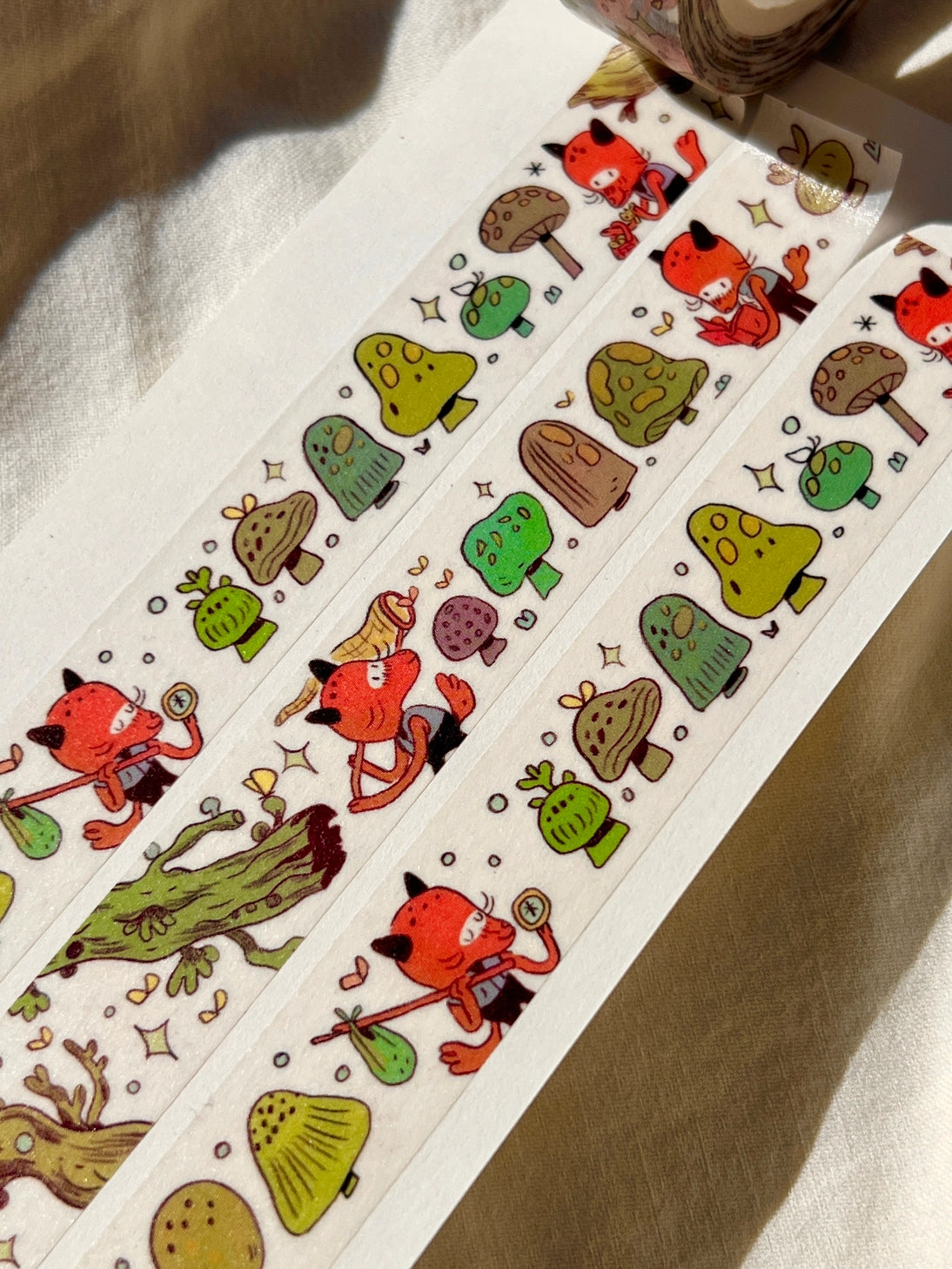 This washi tape features a little fox on their adventures through the mushroomy forest!

This roll is 15mm wide x 10m of paper tape. Washi tape is super durable and flexible. It tears easily and can be safely applied to a variety of surfaces; it doesn’t leave a sticky residue behind, making it especially ideal for stationery and hanging prints temporarily.