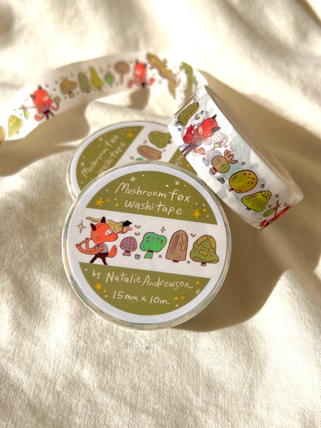 This washi tape features a little fox on their adventures through the mushroomy forest!

This roll is 15mm wide x 10m of paper tape. Washi tape is super durable and flexible. It tears easily and can be safely applied to a variety of surfaces; it doesn’t leave a sticky residue behind, making it especially ideal for stationery and hanging prints temporarily.