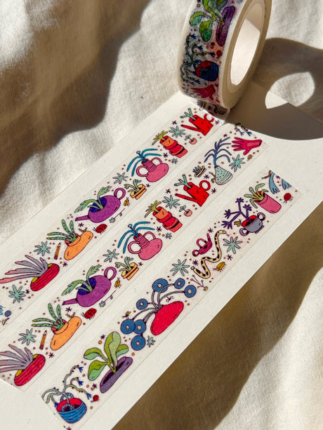 This washi features a vibrant garden with little bugs and even a snake!