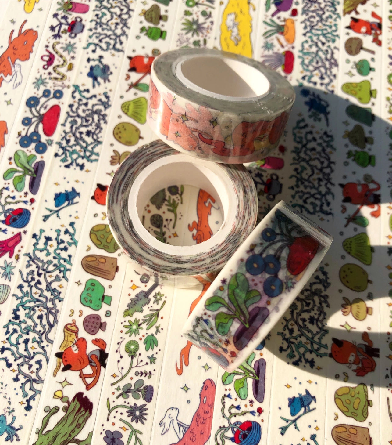 This washi features a vibrant garden with little bugs and even a snake!