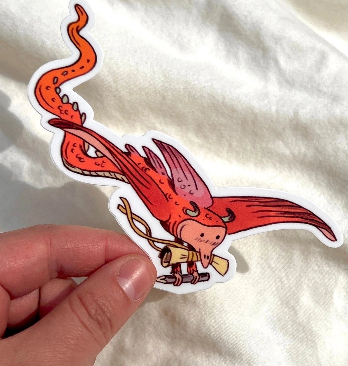 This Scroll Bearer matte sticker is 3.89" x 4". Great for water bottles, laptops or notebooks! They’re durable and waterproof and the thick vinyl protects the stickers from scratching, water and sunlight.