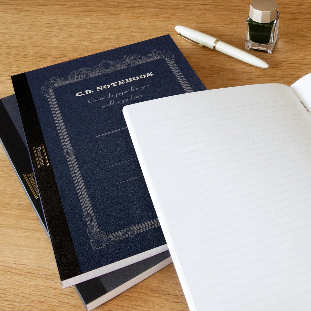 High-quality notebooks are ideal for jotting down ideas, taking notes, sketching, making lists and more. They are perfect for use at home or the office.&nbsp;


Contains silky white, acid free paper that allows for effortless writing.
Notebooks available in ruled, grid and plain paper options.
Heavy duty covers feature a glitter accent.
Silver and gold foil text on the cover also decorate this upscale notebook.
Sturdy thread binding allows the notebook to lay flat for comfortable writing.
Red threading matc