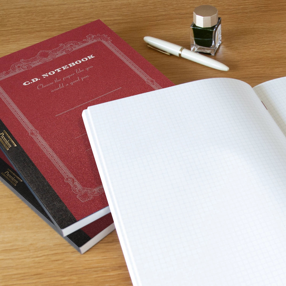 High-quality notebooks are ideal for jotting down ideas, taking notes, sketching, making lists and more. They are perfect for use at home or the office.&nbsp;


Contains silky white, acid free paper that allows for effortless writing.
Notebooks available in ruled, grid and plain paper options.
Heavy duty covers feature a glitter accent.
Silver and gold foil text on the cover also decorate this upscale notebook.
Sturdy thread binding allows the notebook to lay flat for comfortable writing.
Red threading matc