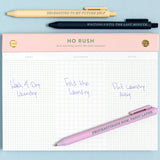 Meet your new favorite procrastination tool—the No Rush Notepad! This 6x8” desk pad is perfect for loosely organized to-do lists with sections for Today, Tomorrow, and… Never. With 75 perforated grid sheets on smooth 120gsm paper, plus a luxe gold post-bound top, it’s equal parts practical and playful. Whether you’re tackling tasks or artfully avoiding them, this notepad keeps everything in sight—just not necessarily on schedule. Ideal for office desks, student planners, or anyone with a sense of humor abou