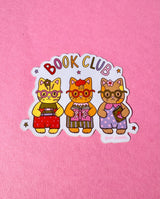 These adorable book themed stickers are perfect for sharing with your book club friends. It features 3 adorable cats with their favorite reads!

These matte vinyl stickers feature an original design and are water, weather, and scratch proof. Perfect for putting on water bottles, computers or just about anywhere else.