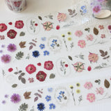 This pressed flower PET tape is designed for journalers, botanical enthusiasts, and stationery lovers drawn to the delicate beauty of real pressed florals. Featuring scanned camellias, delphiniums, blue cardinals, and plum blossoms, each flower is pre-cut and ready to peel.

Extra wide at 50mm with a shiny finish that layers beautifully over any journal page, envelope, or scrapbook layout.

Size: 50mm x 10m