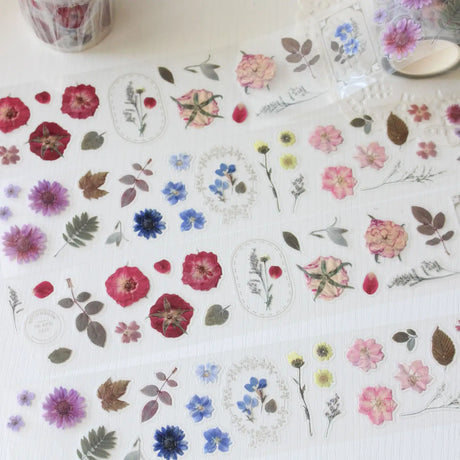 This pressed flower PET tape is designed for journalers, botanical enthusiasts, and stationery lovers drawn to the delicate beauty of real pressed florals. Featuring scanned camellias, delphiniums, blue cardinals, and plum blossoms, each flower is pre-cut and ready to peel.

Extra wide at 50mm with a shiny finish that layers beautifully over any journal page, envelope, or scrapbook layout.

Size: 50mm x 10m