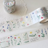 An updated version of our Wildflower PET tape, now with a longer 50cm designer loop for even more creative possibilities.

This wildflower PET tape is designed for journalers, collagers and stationery lovers who want to bring the beauty of the British countryside into their creative projects. Featuring hand-painted watercolour flowers by Rebecca, each illustration is pre-cut and ready to peel - no scissors needed.

Extra wide at 50mm with a matt transparent finish that layers beautifully over any journal pa