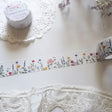 This wildflower washi tape is inspired by long summer walks through British meadows in full bloom. Featuring hand-drawn cornflowers, lavender and red flax, it captures that warm feeling of a summer afternoon surrounded by wildflowers. Designed and hand drawn in the UK by Rebecca.

Length: 10m&nbsp;
Width: 25mm
