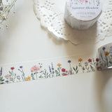 This wildflower washi tape is inspired by long summer walks through British meadows in full bloom. Featuring hand-drawn cornflowers, lavender and red flax, it captures that warm feeling of a summer afternoon surrounded by wildflowers. Designed and hand drawn in the UK by Rebecca.

Length: 10m&nbsp;
Width: 25mm
